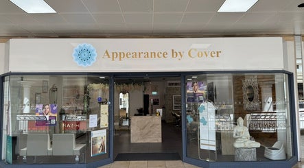 Entrance of Cover Beauty - Appearance, Newcastle, England, GB with stylish decor and signage.