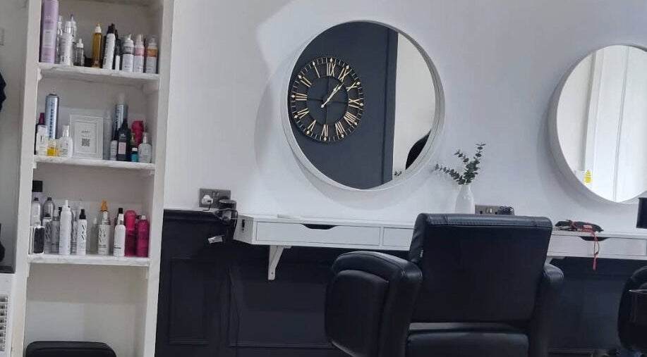 Elegant styling station at Becki Nettel Hair and Beauty, Burton upon Trent, England, GB with chic decor.