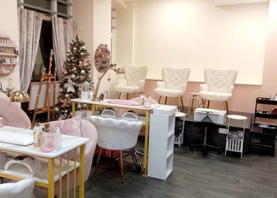 Relaxing beauty lounge at Myrto Zafeiropoulou, Birmingham, England, GB adorned with elegant decor.