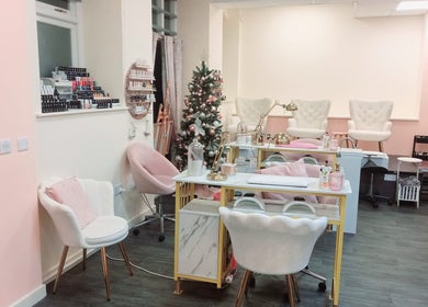Elegant nail studio at Nails and the City, Birmingham, England, GB with plush seating and decor.