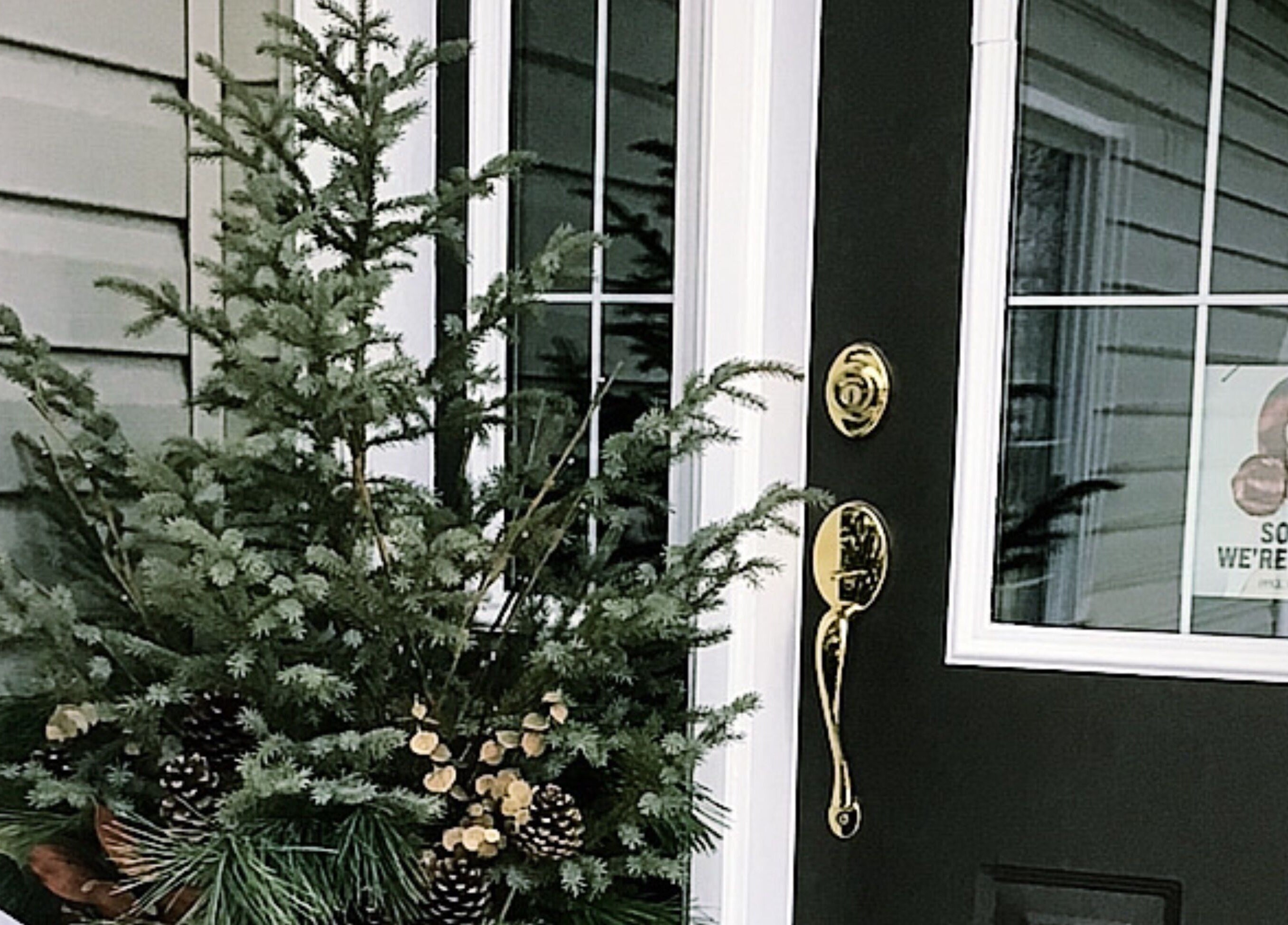 Stylish front door with wreath at Karen Giesbrecht Salon, Winkler, Manitoba, CA.