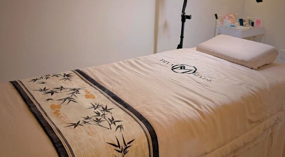 Spa bed at Diva Me At Thomson Rooftop, Singapore, SG, with elegant design for relaxation.