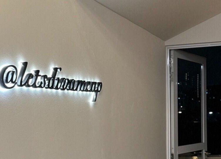 Illuminated @letsdimeup sign at Diva Me At Thomson Rooftop, Singapore, Singapore, SG.