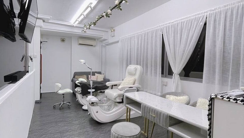 Luxurious treatment room at Diva Me At Woodlands, Singapore, Singapore, SG with elegant chairs and decor.
