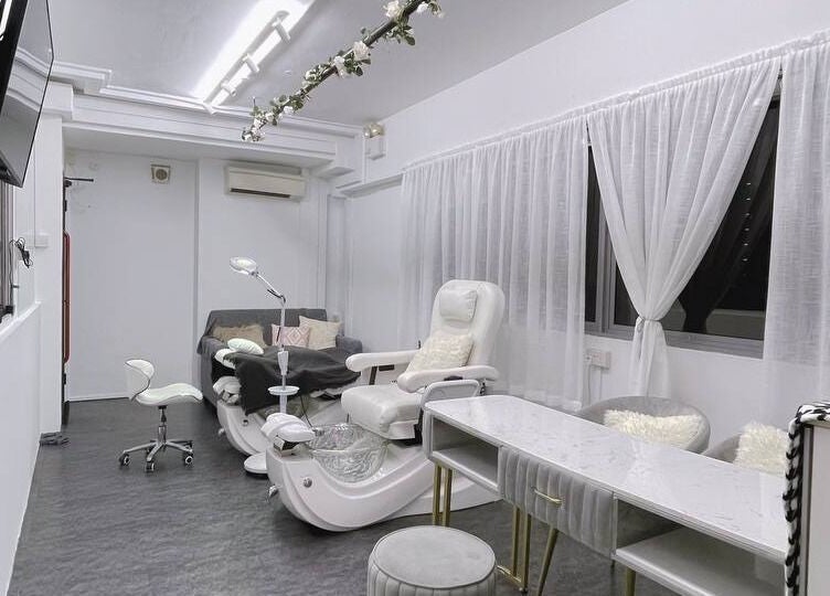 Luxurious treatment room at Diva Me At Woodlands, Singapore, Singapore, SG with elegant chairs and decor.
