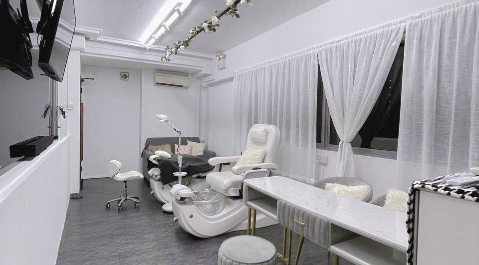 Luxurious treatment room at Diva Me At Woodlands, Singapore, Singapore, SG with elegant chairs and decor.