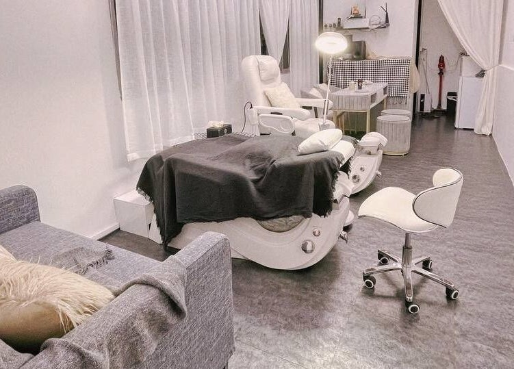 Luxurious spa setting at Diva Me At Woodlands, Singapore, SG with plush seating and serene decor.