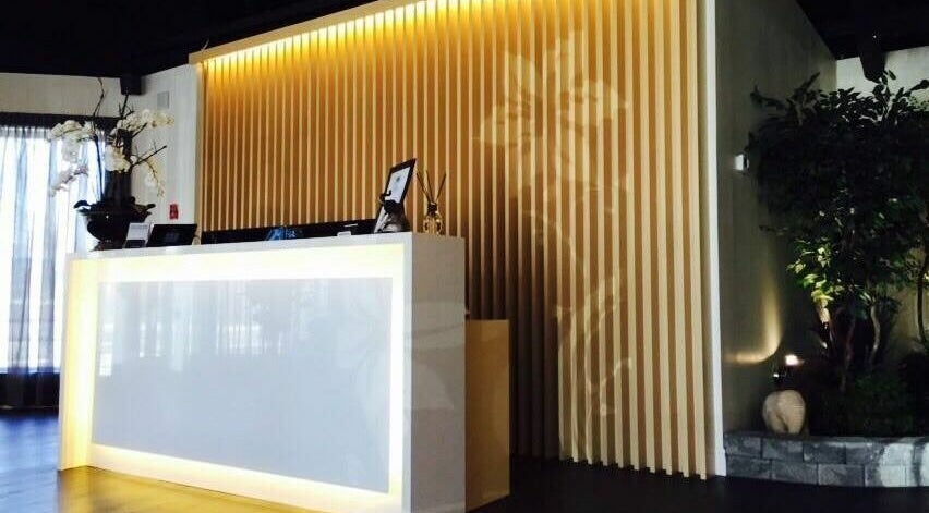 Footscape Spa reception area at Richmond Hill, Ontario, CA with elegant lighting and decor.