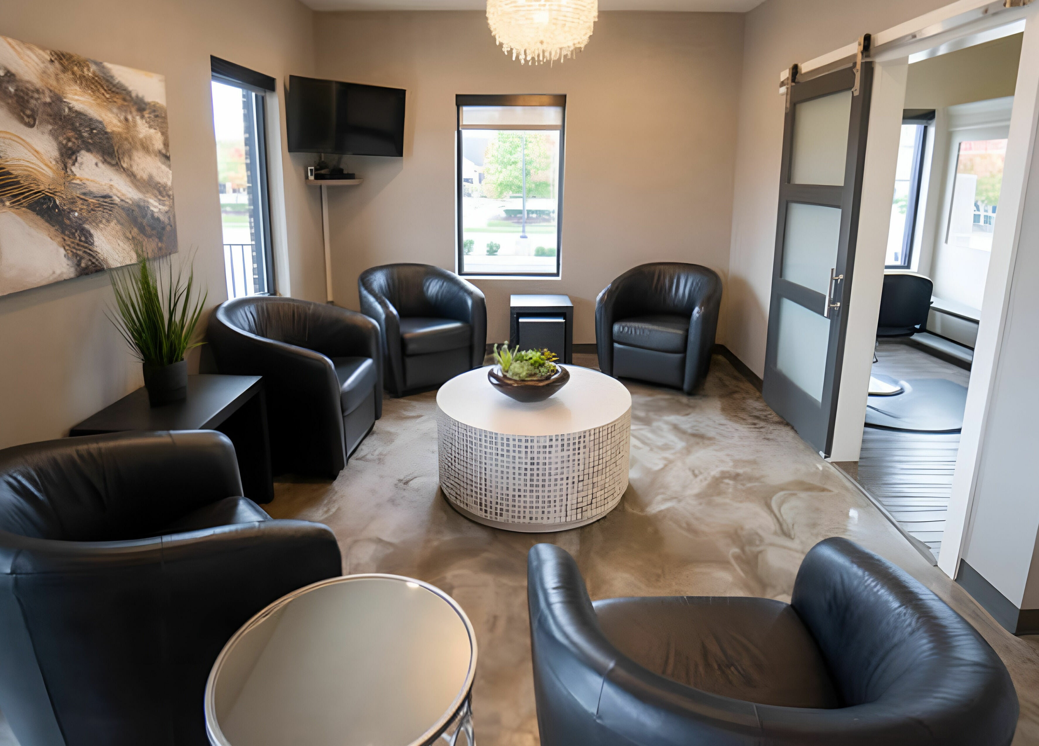 Elegant waiting area with plush chairs at Cheveux Salon, Hendersonville, Tennessee, US. Modern and inviting space.