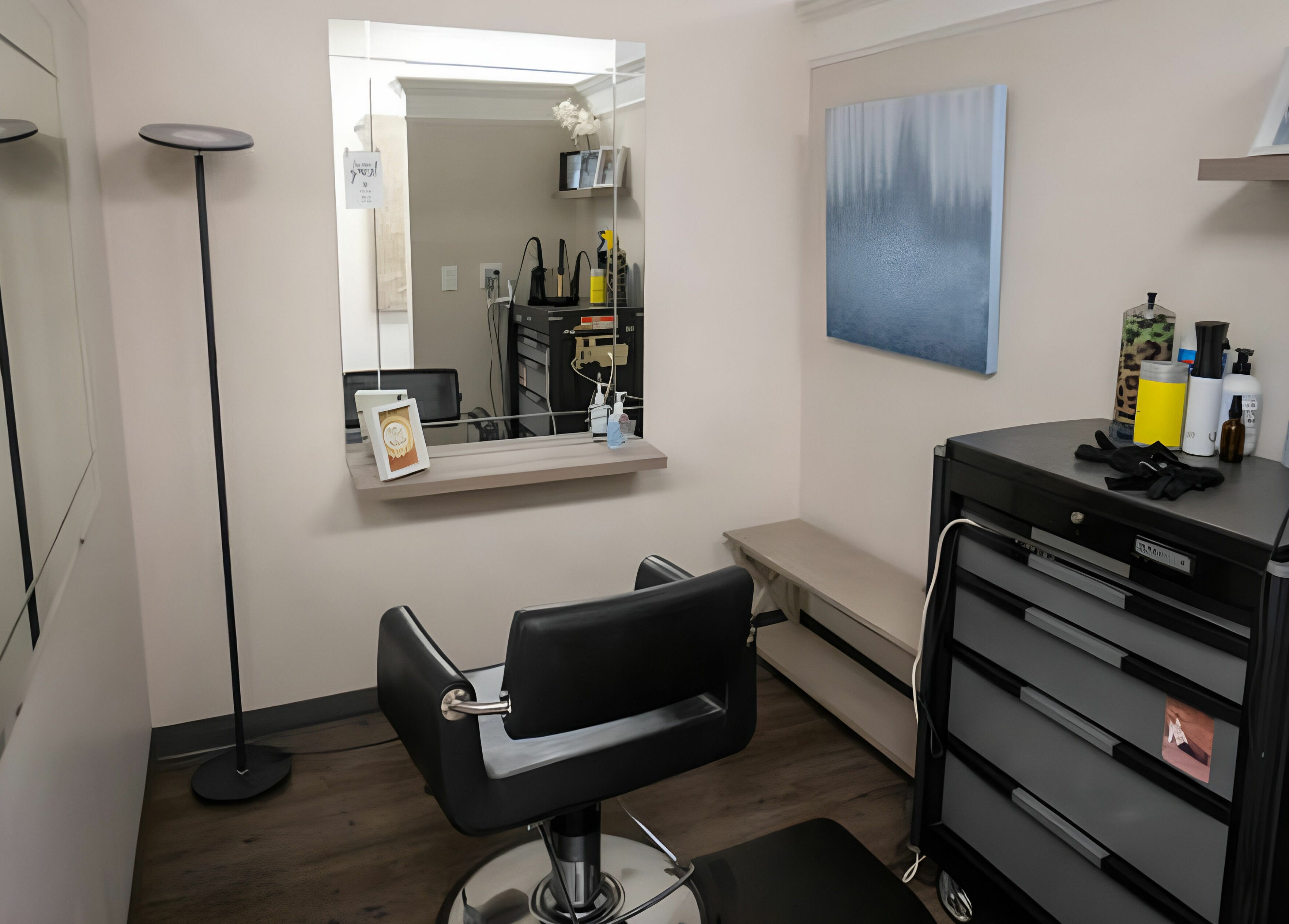 Modern styling station at Cheveux Salon, Hendersonville, Tennessee, US, featuring sleek decor and professional tools.