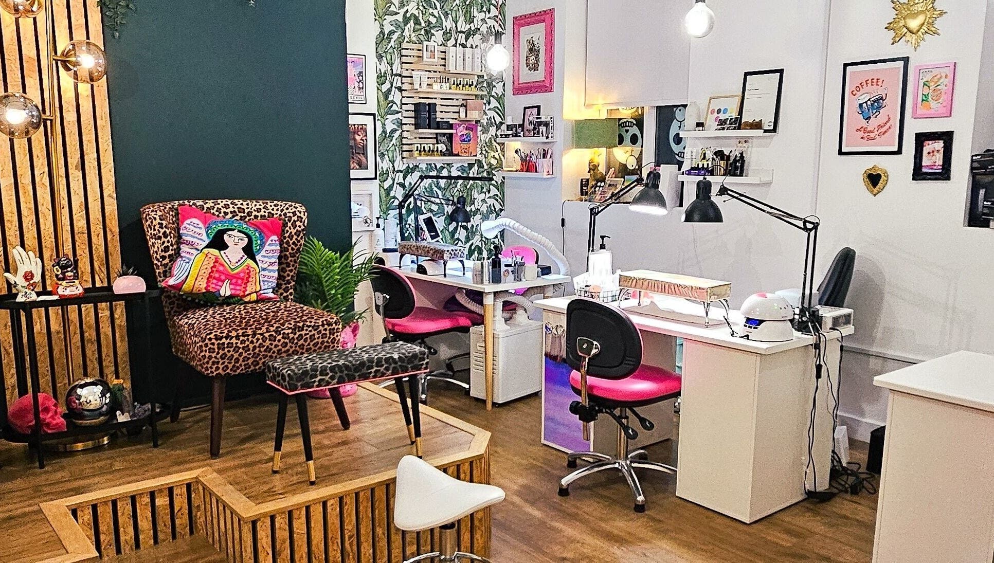 Stylish interior of Offbeat Beauty Collective, Sheffield, England, GB showcasing vibrant decor and beauty stations.
