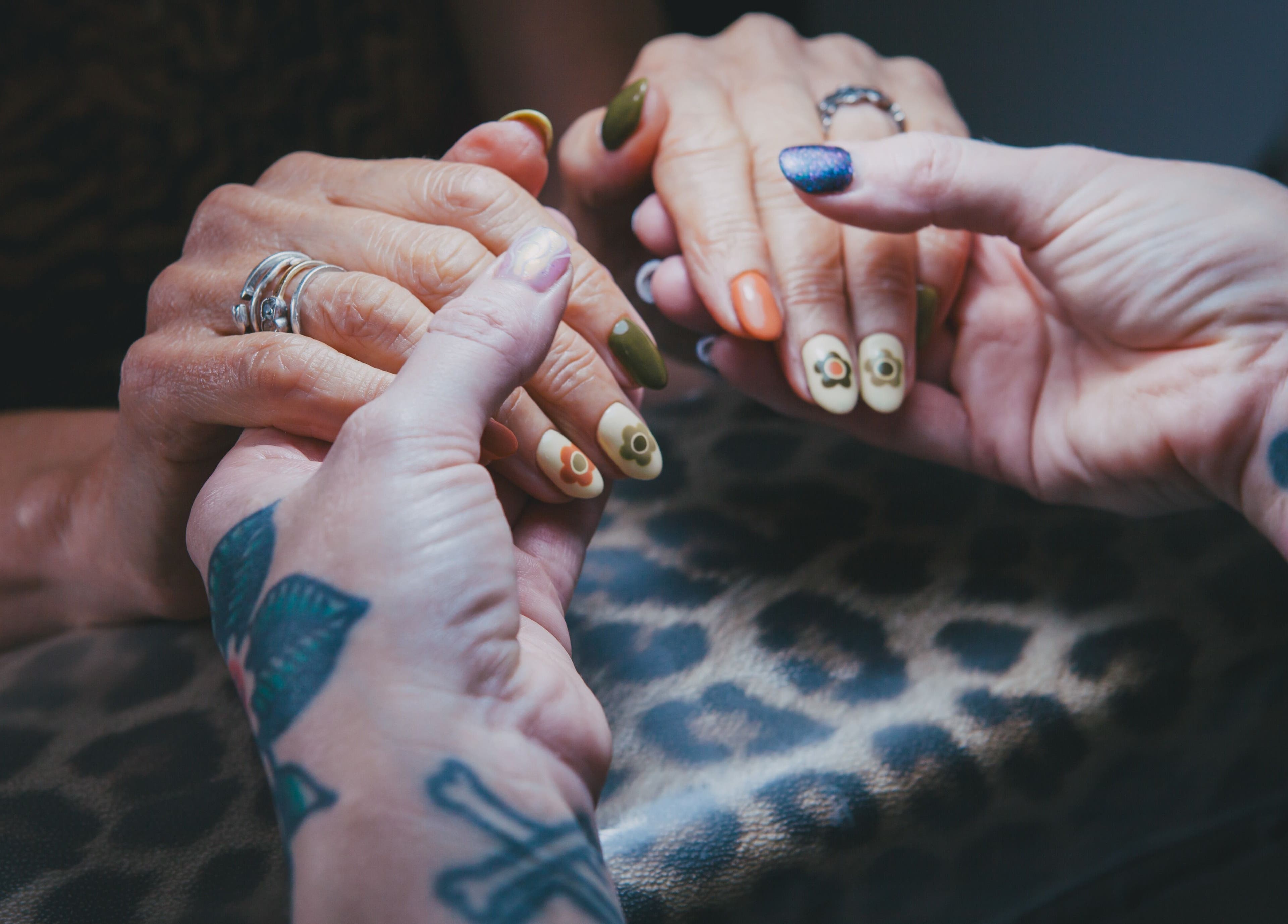 Nail art at Offbeat Beauty Collective in Sheffield, England, GB, showcasing vibrant floral designs.