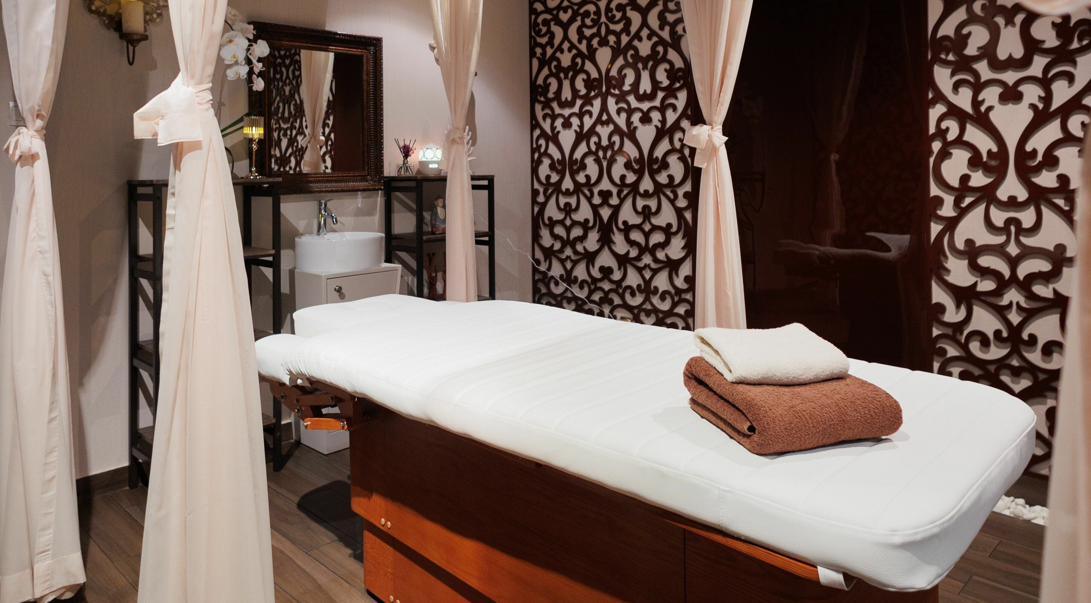 Luxurious treatment room at Lavana Spa - Grand Excelsior Hotel Bur Dubai, featuring elegant decor in Dubai, Dubai, AE.
