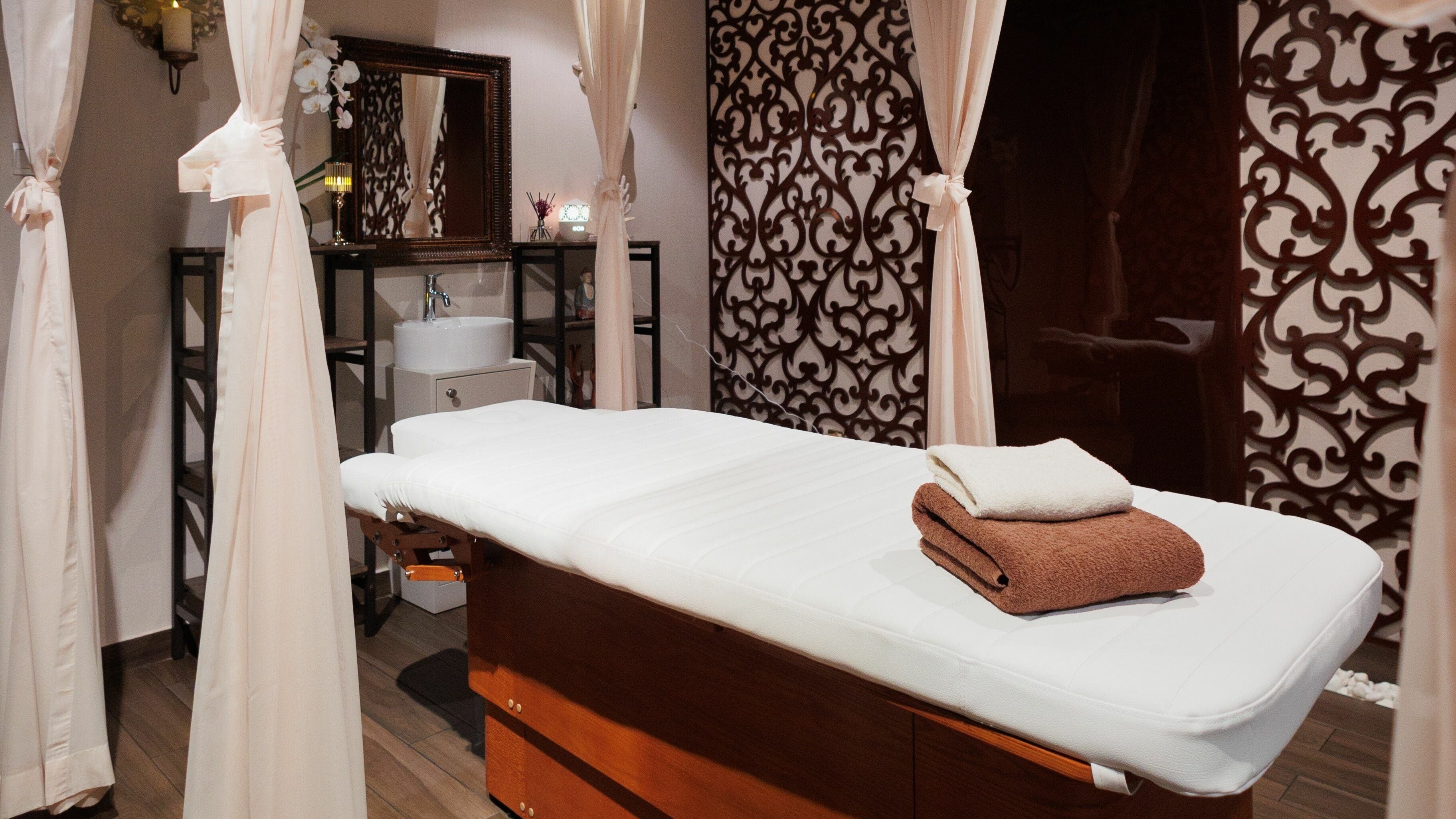 Luxurious treatment room at Lavana Spa - Grand Excelsior Hotel Bur Dubai, featuring elegant decor in Dubai, Dubai, AE.