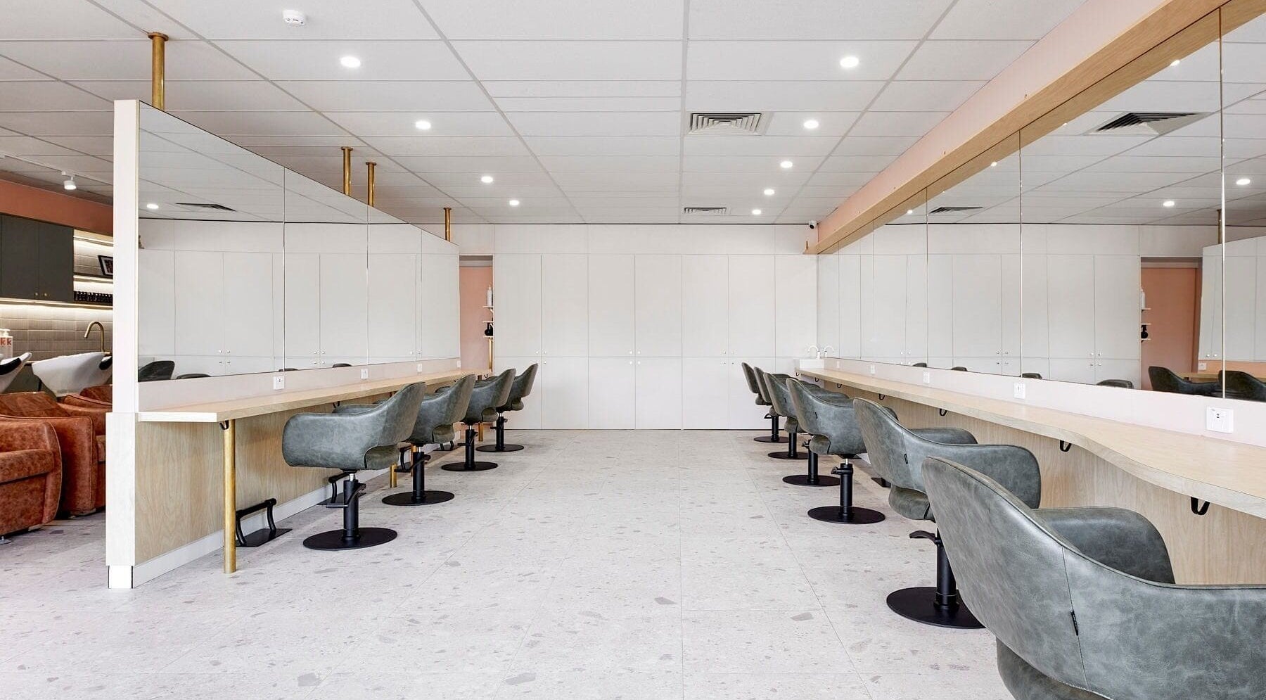 Interior of Wild Rose Hair Inglewood, showcasing modern styling chairs and mirrors in Inglewood, Western Australia, AU.