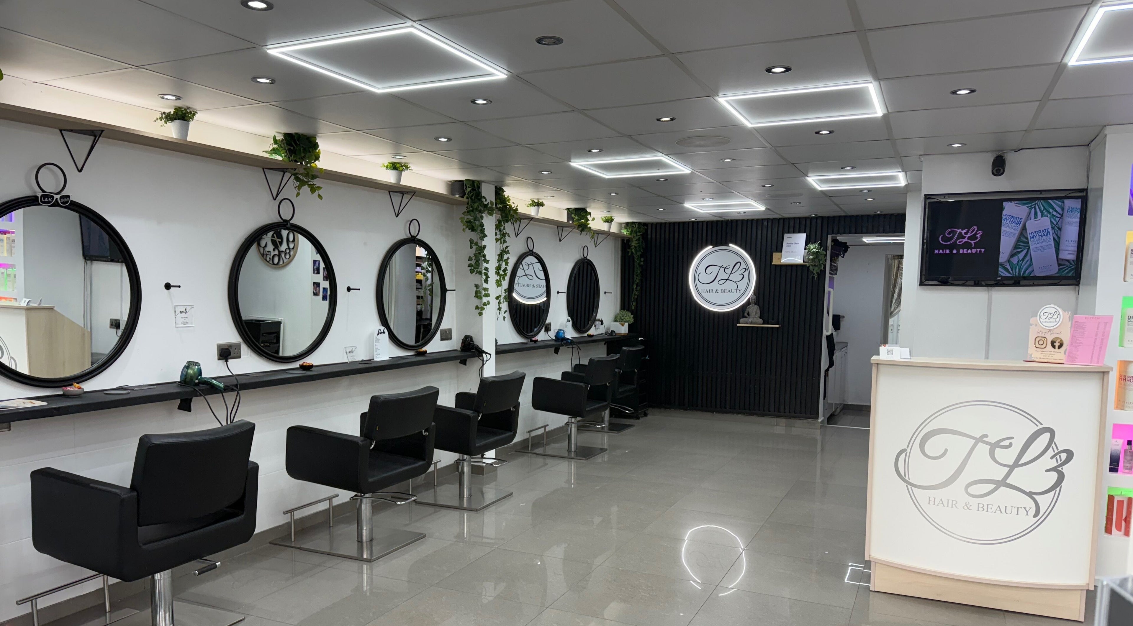Stylish interior of TL3 Hair and Beauty, a salon in London Colney, England, GB with modern design.
