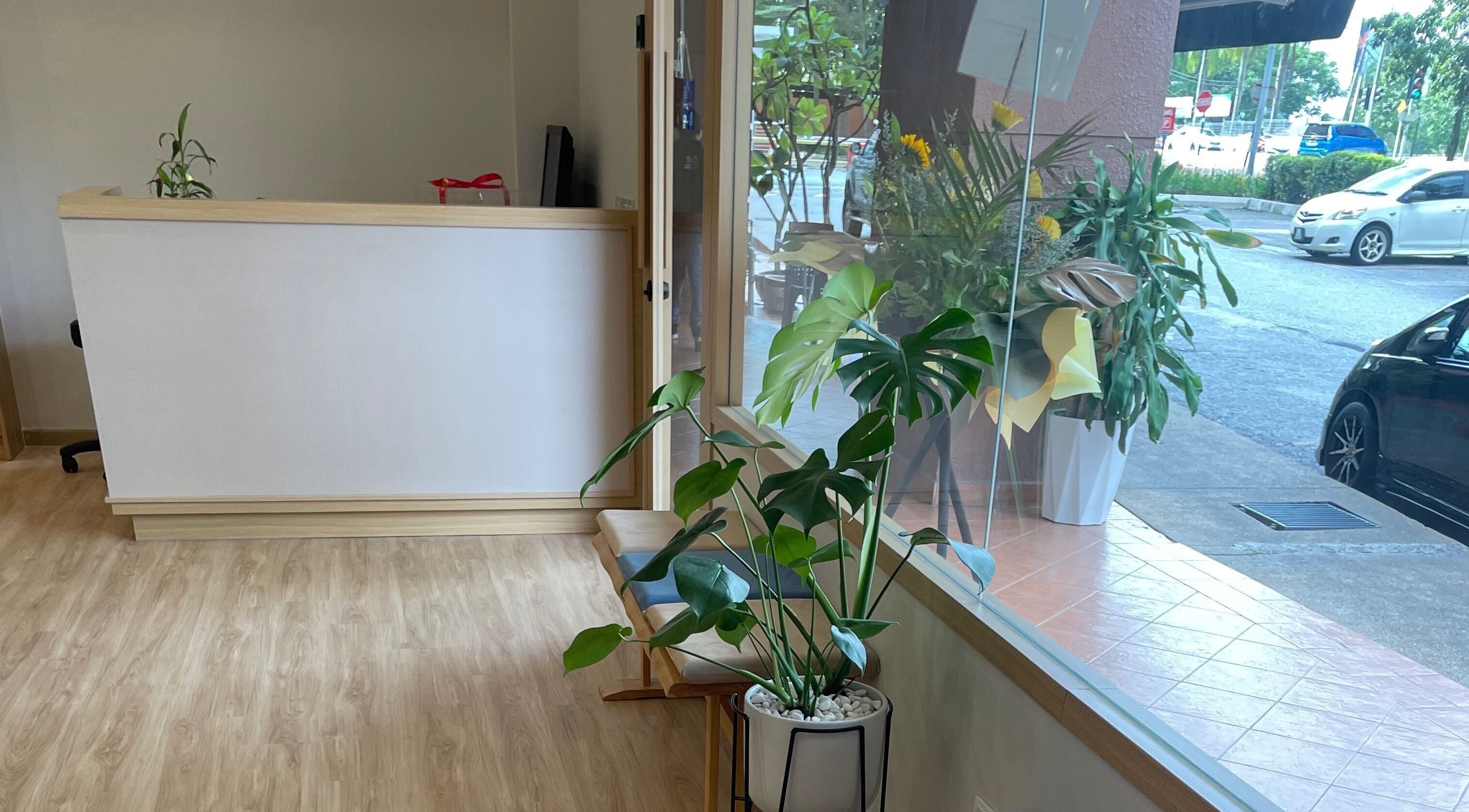 Bright, inviting entrance of Twt Hair Studio in Petaling Jaya, Selangor, MY with elegant decor and greenery.