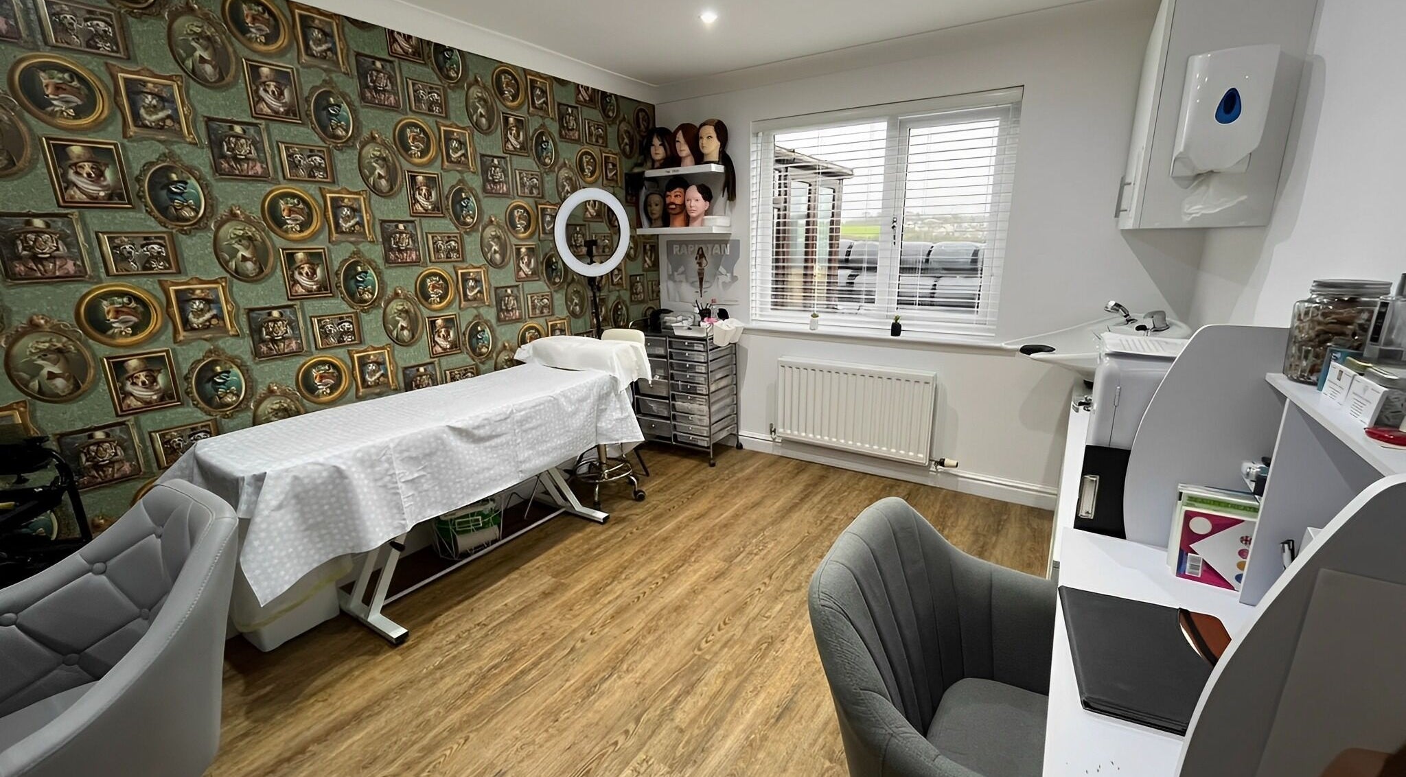 Chic treatment room at Ultra Glow Beauty, Workington, England, GB with ornate decor and professional setup.