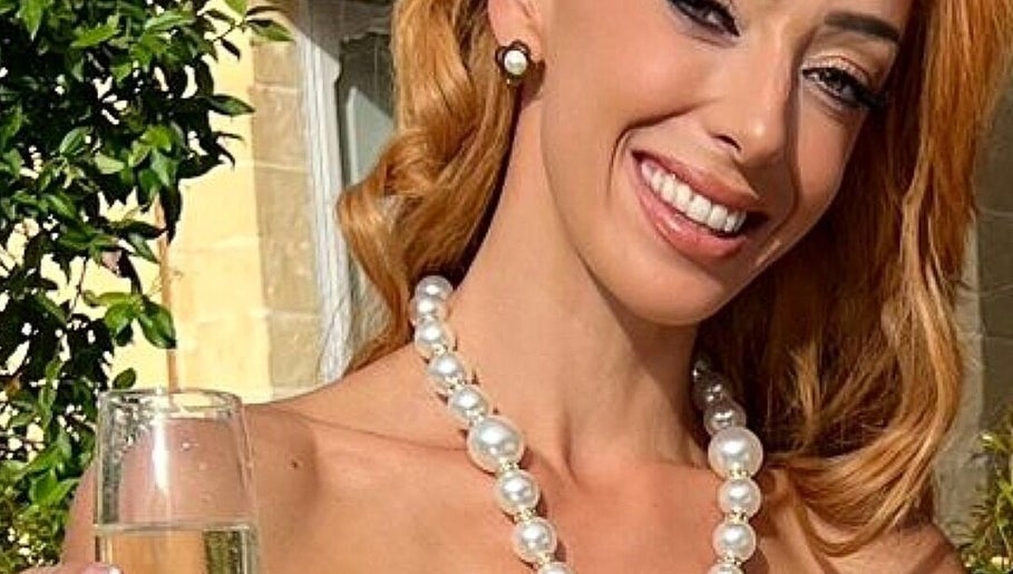 Elegant woman with a radiant smile at Rebekah Nails and Make Up, Is-swieqi, MT.