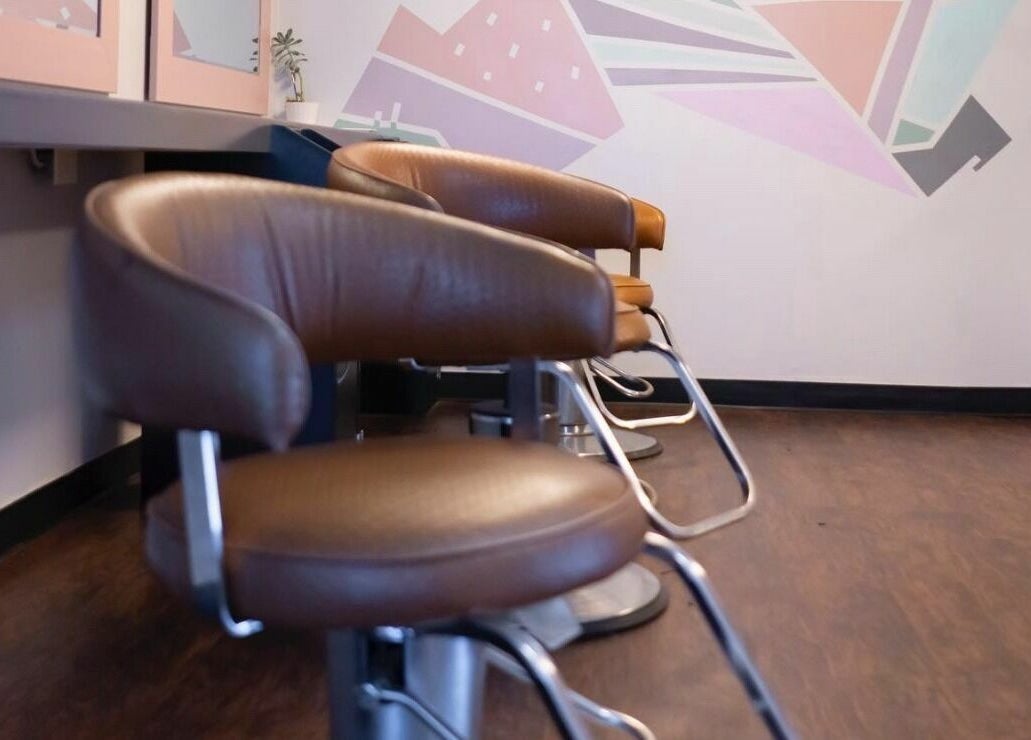 Modern salon chairs inside The Grey Rose Salon in Dallas, Pennsylvania, US showcasing sleek design.