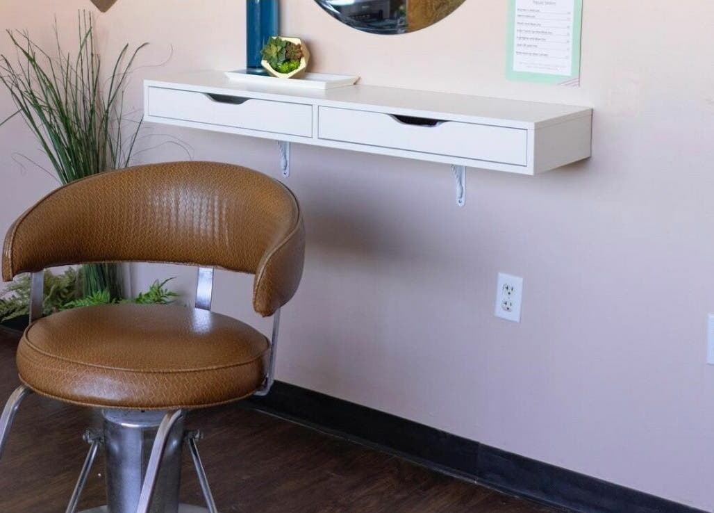 Chic salon chair and decor at The Grey Rose Salon, Dallas, Pennsylvania, US.