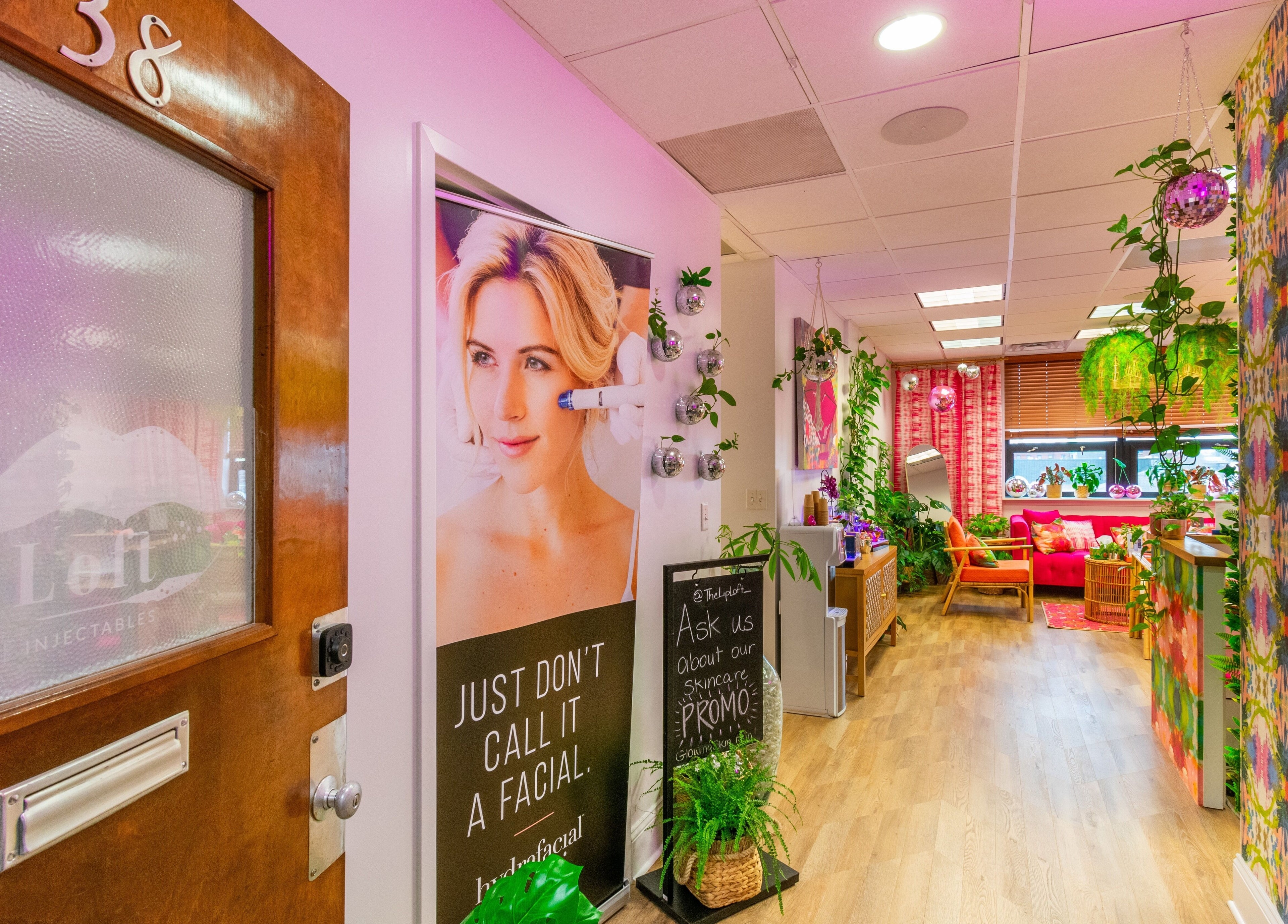 Entrance of The Lip Loft with colorful decor in Medford, Massachusetts, US showcasing vibrant beauty venue.