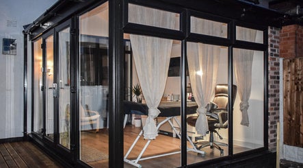 Cozy interior of Lush Lashes & Microblading in Ellesmere Port, England, GB with comfortable treatment chair.