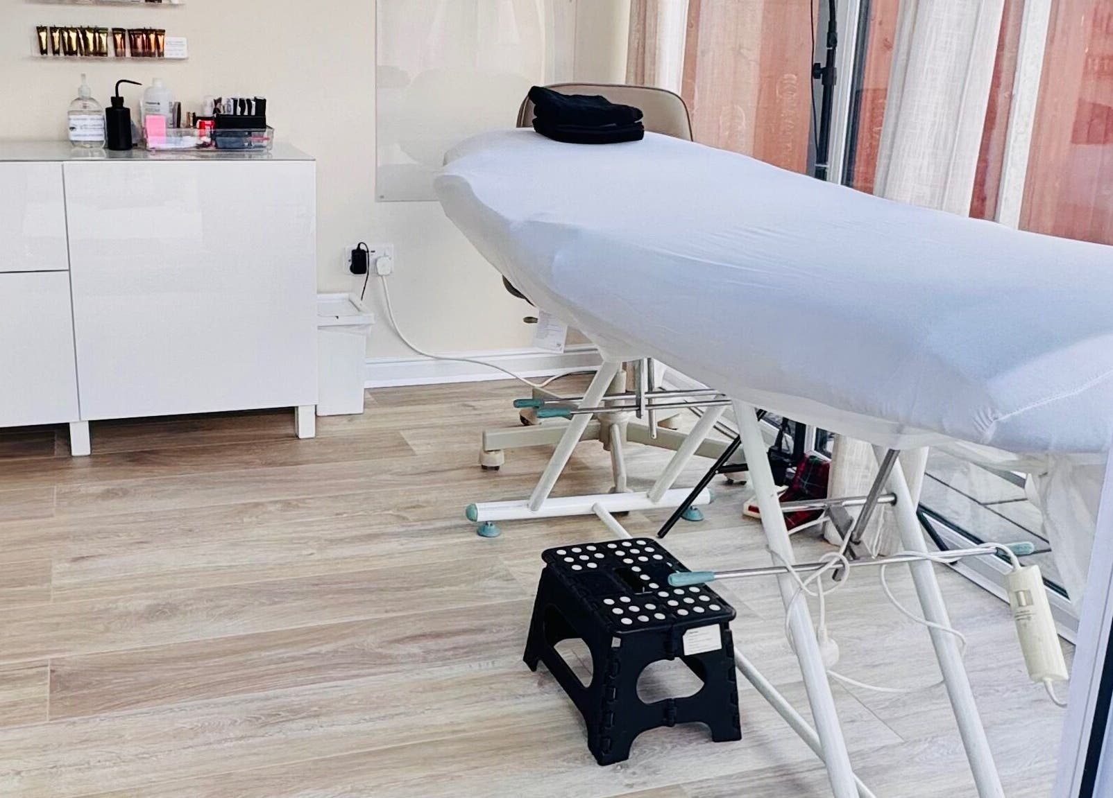 Treatment room at Lush Lashes & Microblading, Ellesmere Port, England, featuring a comfortable therapy bed.