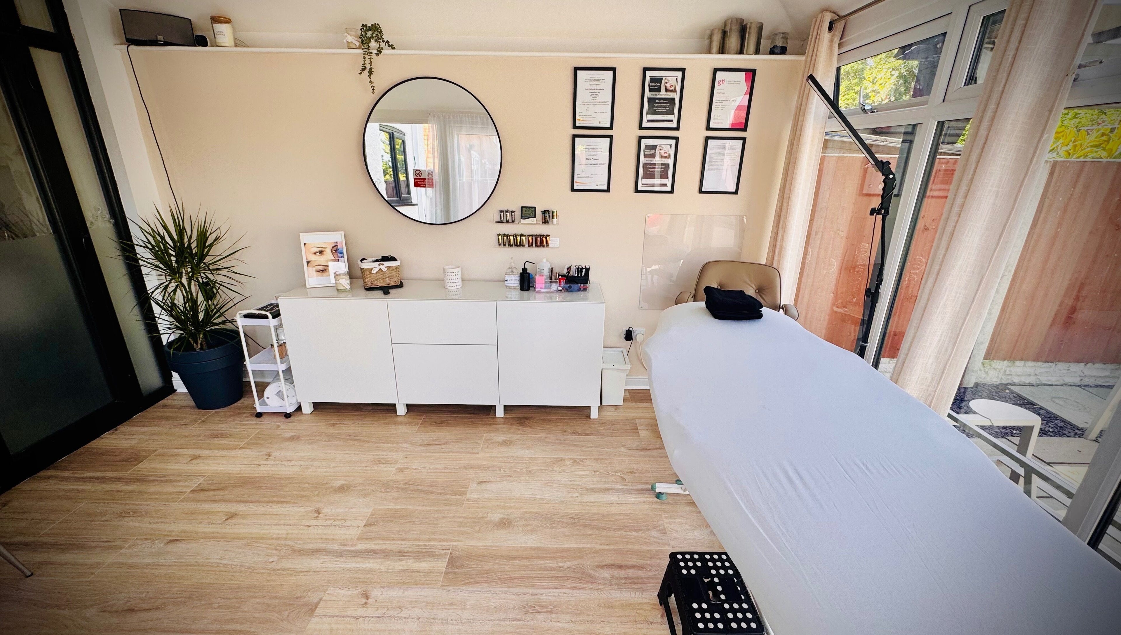 Elegantly designed treatment room at Lush Lashes & Microblading in Great Sutton, England, GB.