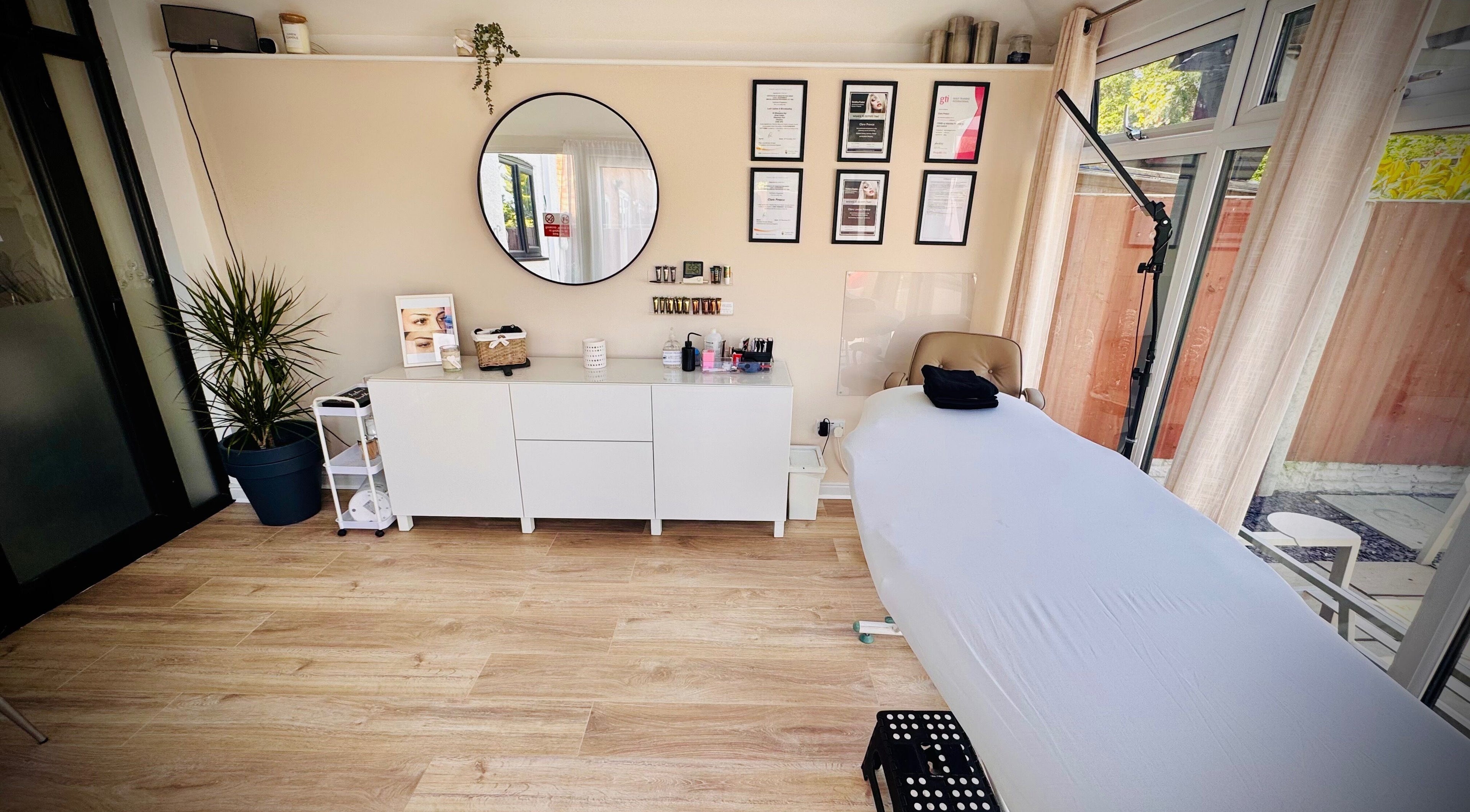 Elegantly designed treatment room at Lush Lashes & Microblading in Great Sutton, England, GB.
