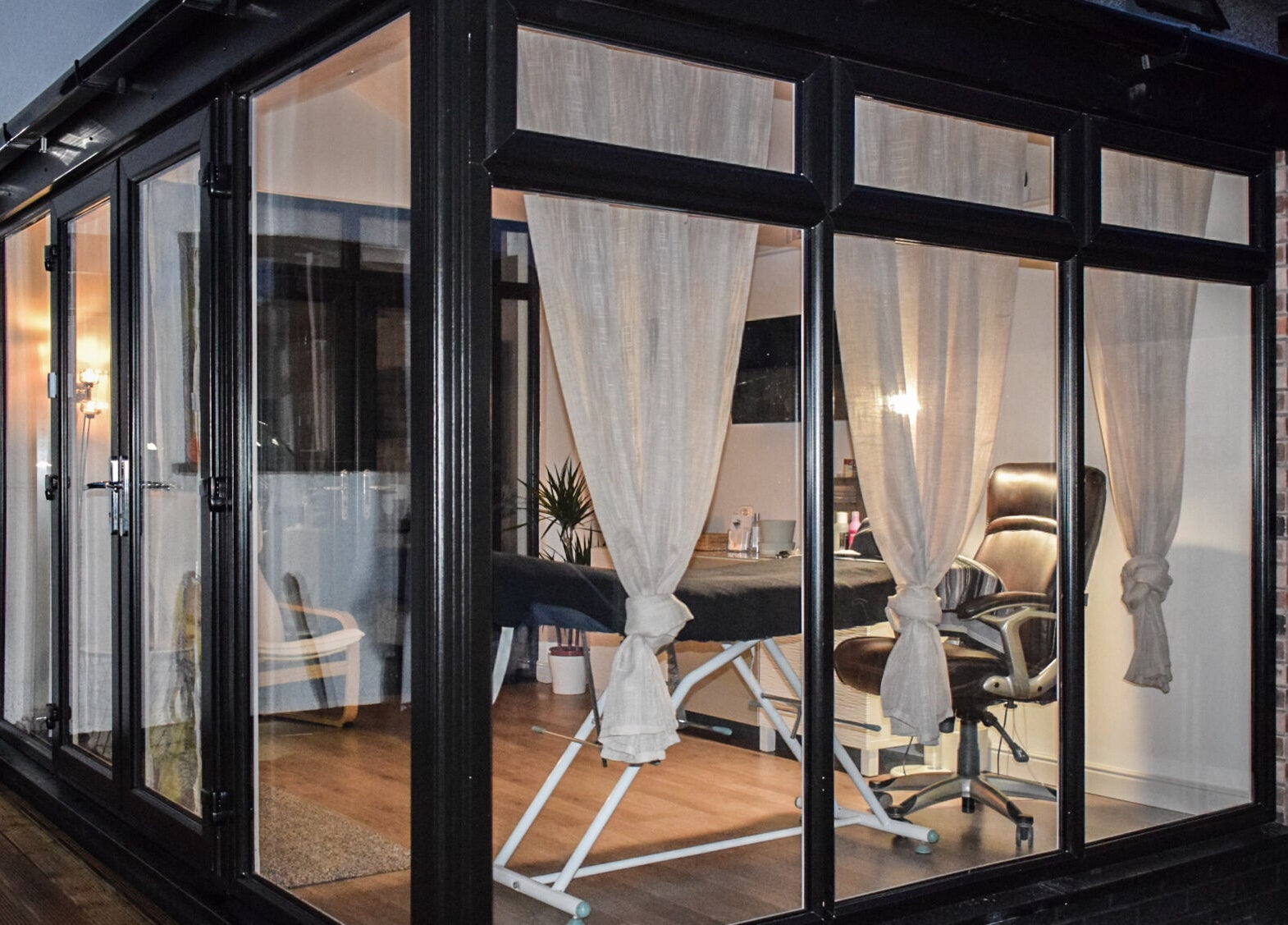 Tranquil interior view of Lush Lashes & Microblading in Great Sutton, England, GB showcasing a cozy setup.