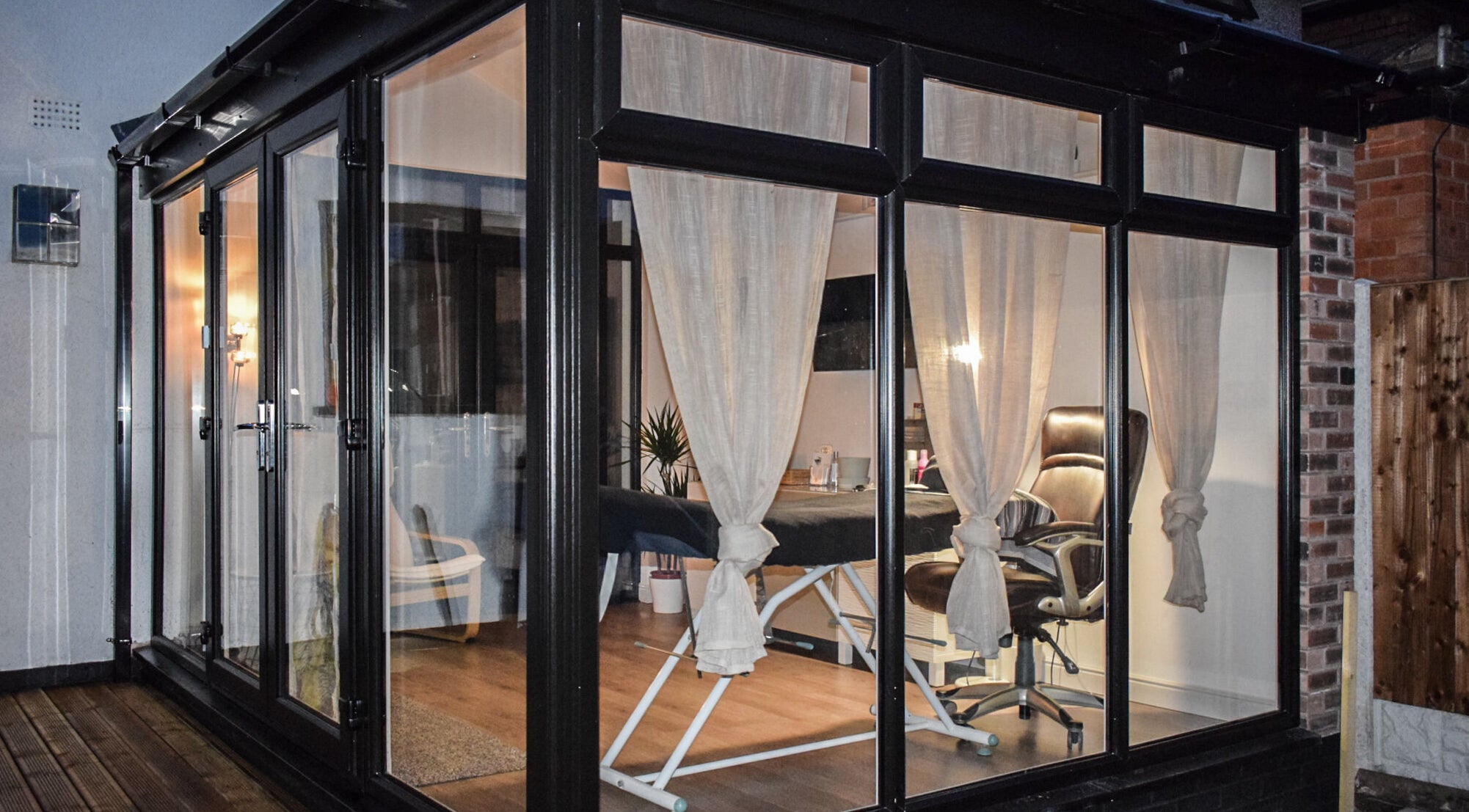 Tranquil interior view of Lush Lashes & Microblading in Great Sutton, England, GB showcasing a cozy setup.