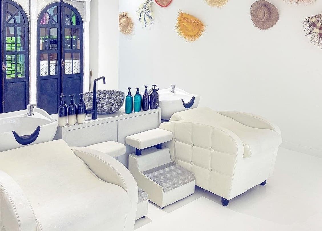 Elegant salon wash stations at Jacob Zinsli Salon in Surfers Paradise, Queensland, AU with stylish decor.