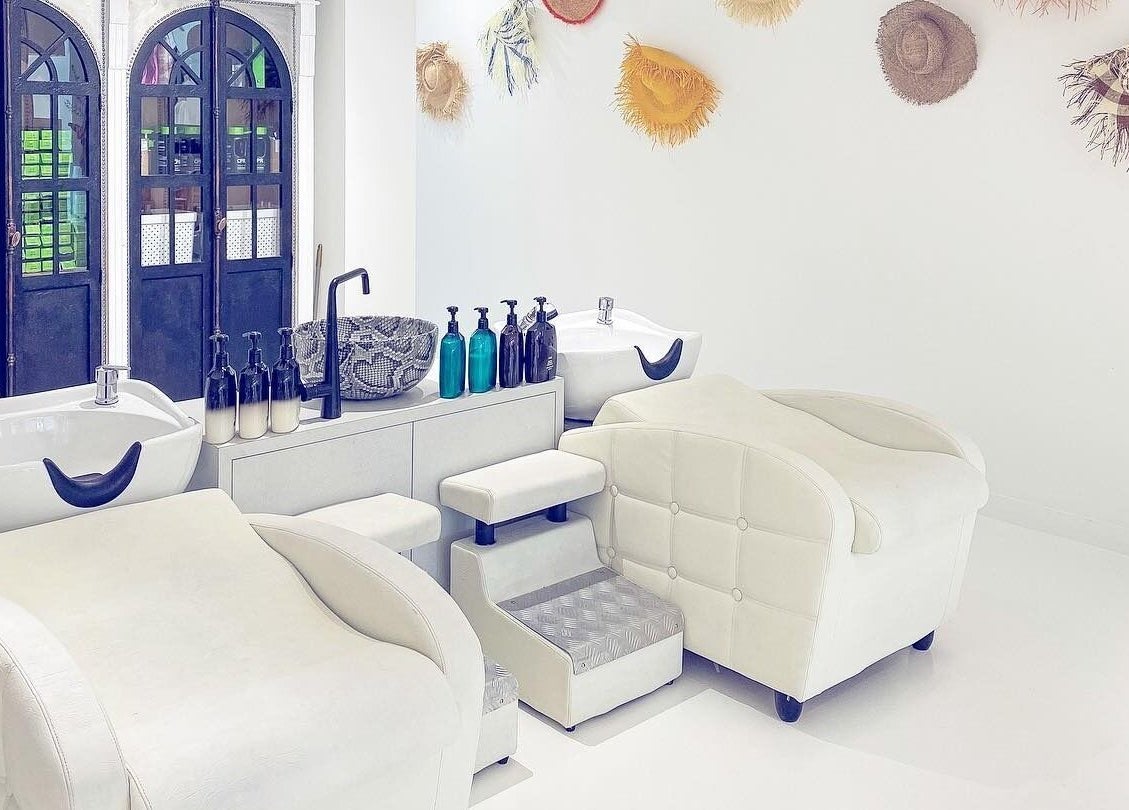 Elegant salon wash stations at Jacob Zinsli Salon in Surfers Paradise, Queensland, AU with stylish decor.