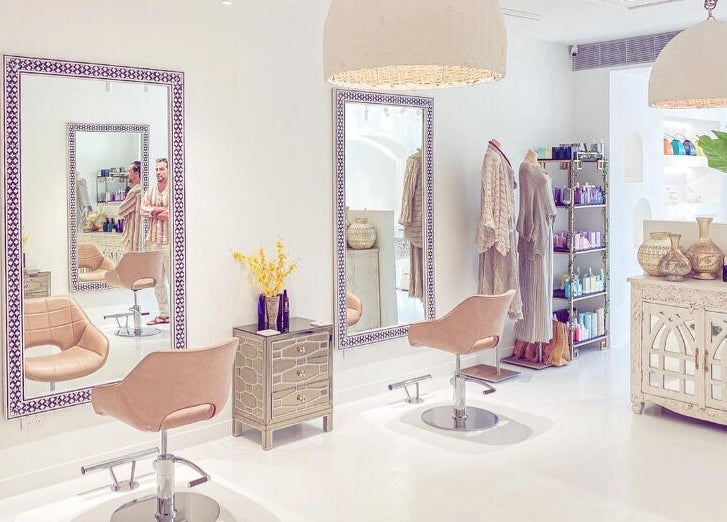Elegant salon at Jacob Zinsli Salon, Surfers Paradise, Queensland, AU featuring chic mirrors and stylish decor.