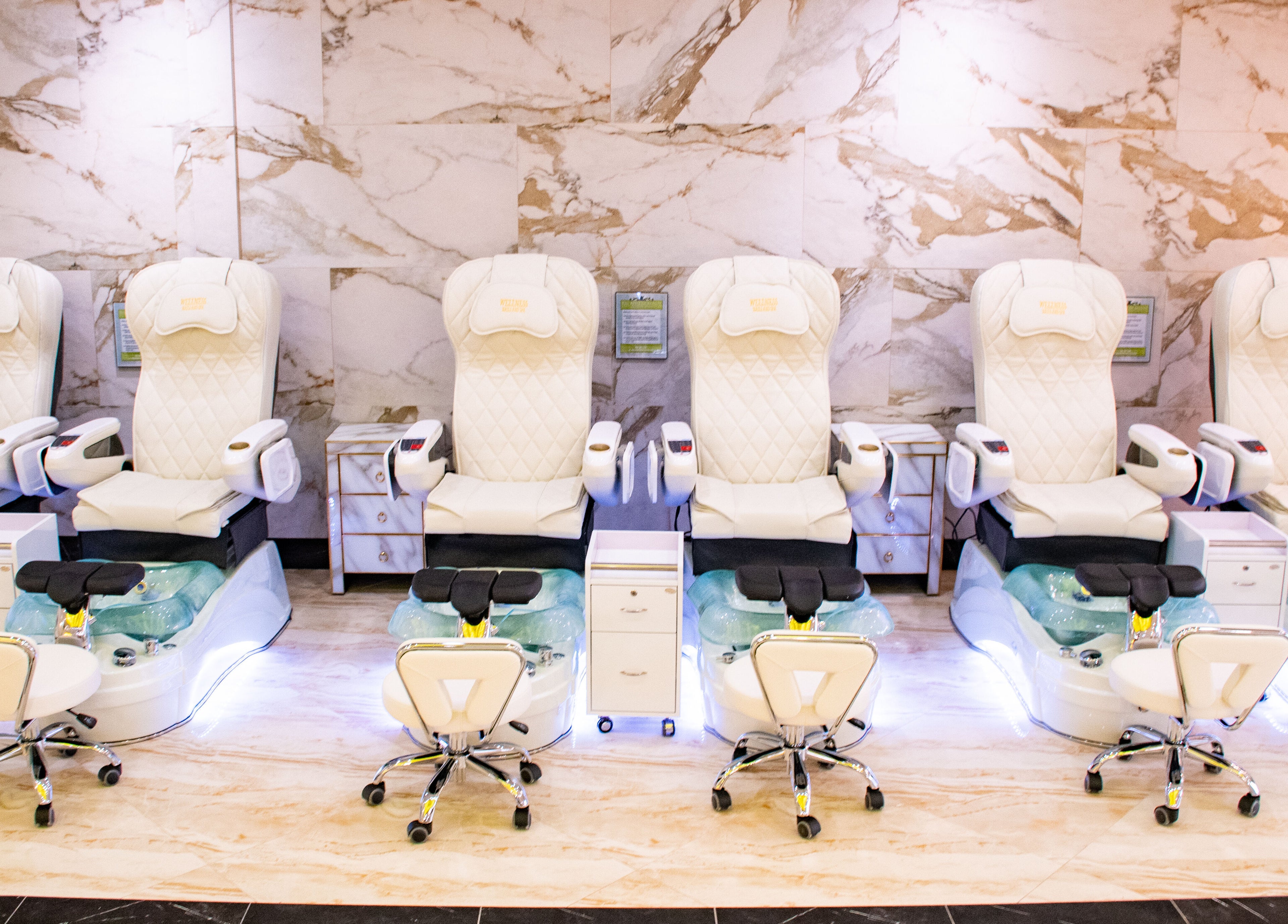Luxurious pedicure chairs at LUXEBABE NAILS & SPA LLC, Boynton Beach, Florida, US, enhancing the spa experience.