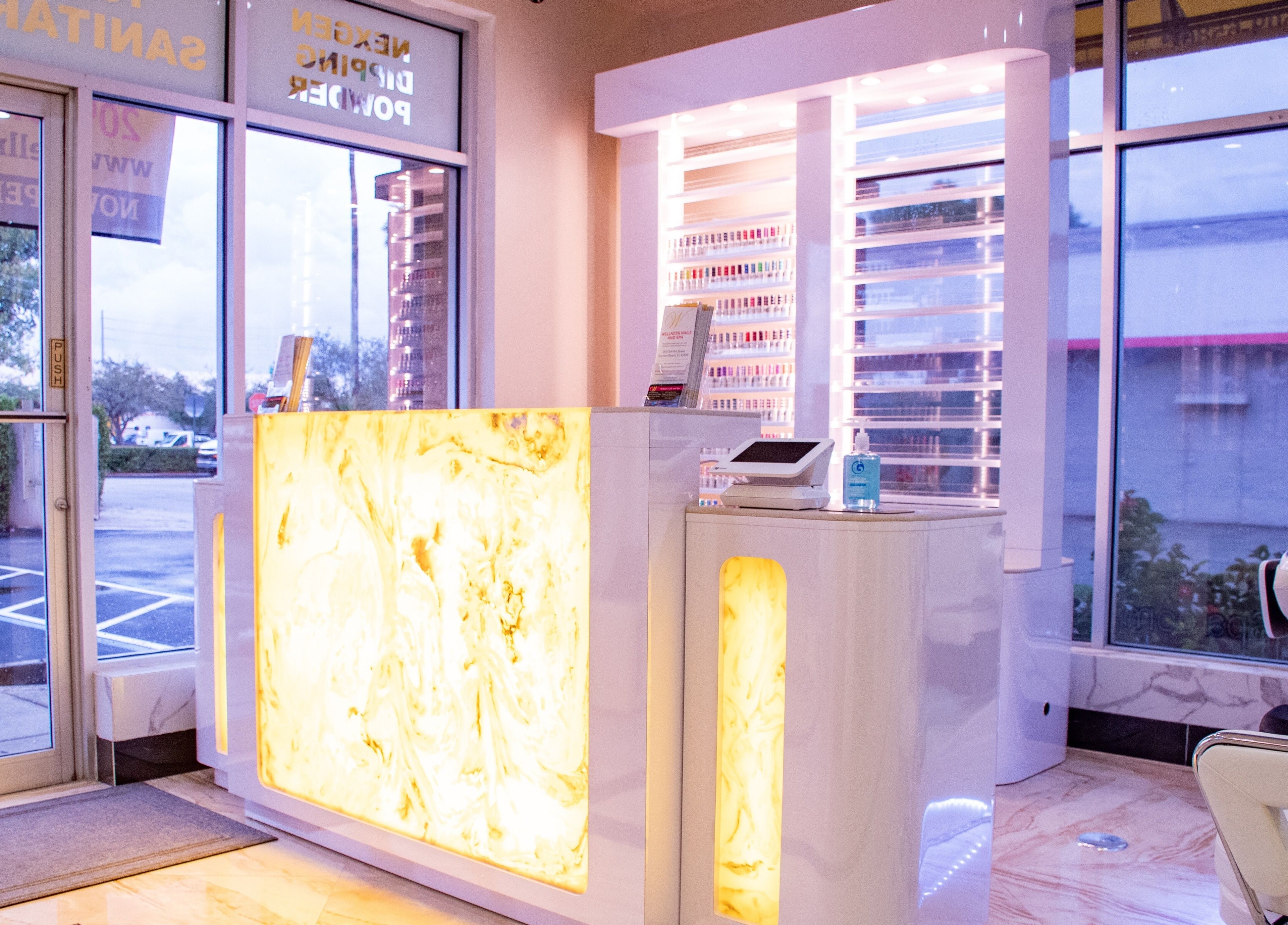 Elegant reception desk at LUXEBABE NAILS & SPA LLC, Boynton Beach, Florida, US, with marble accents.
