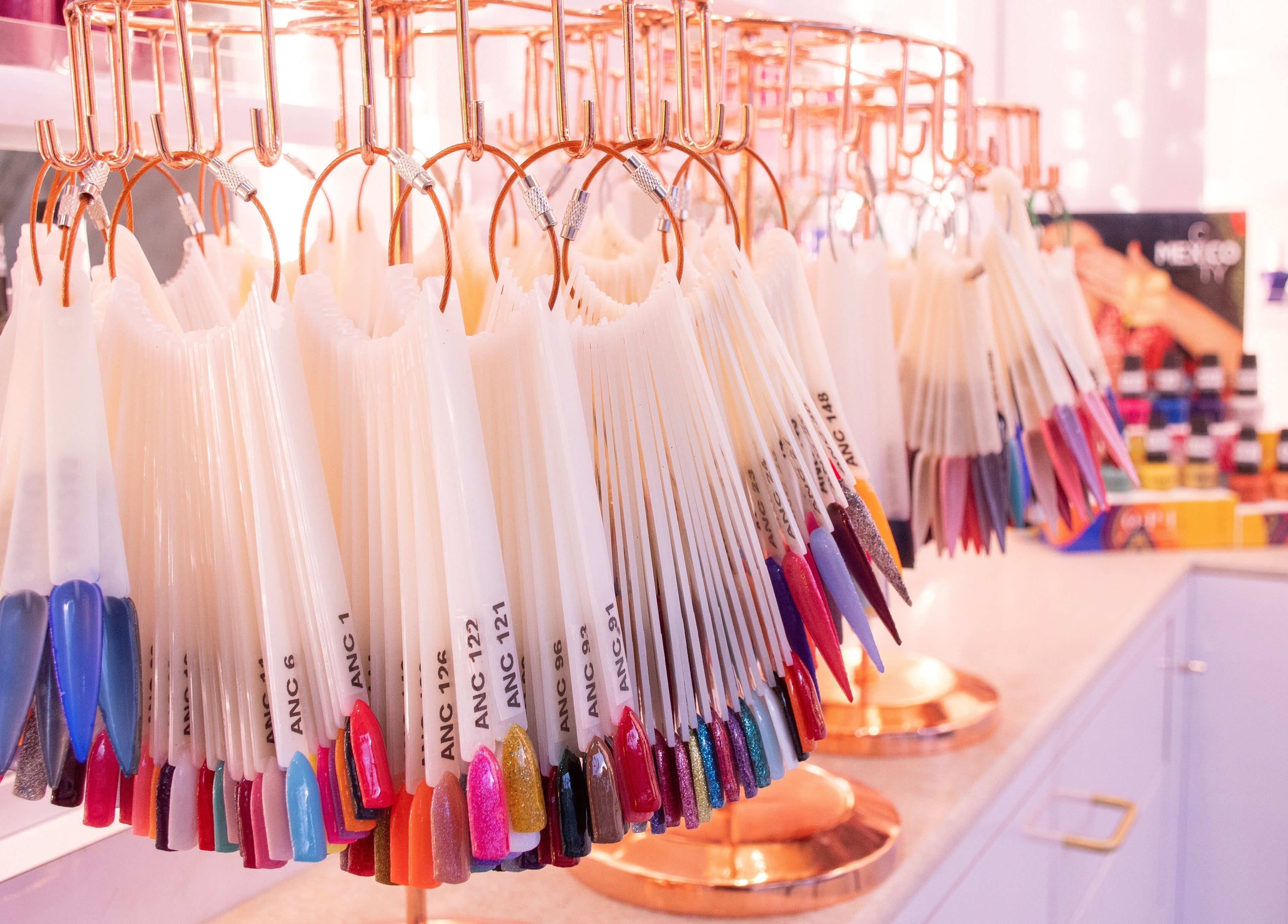 Colorful nail polish samples at LUXEBABE NAILS & SPA LLC, Boynton Beach, Florida, US.