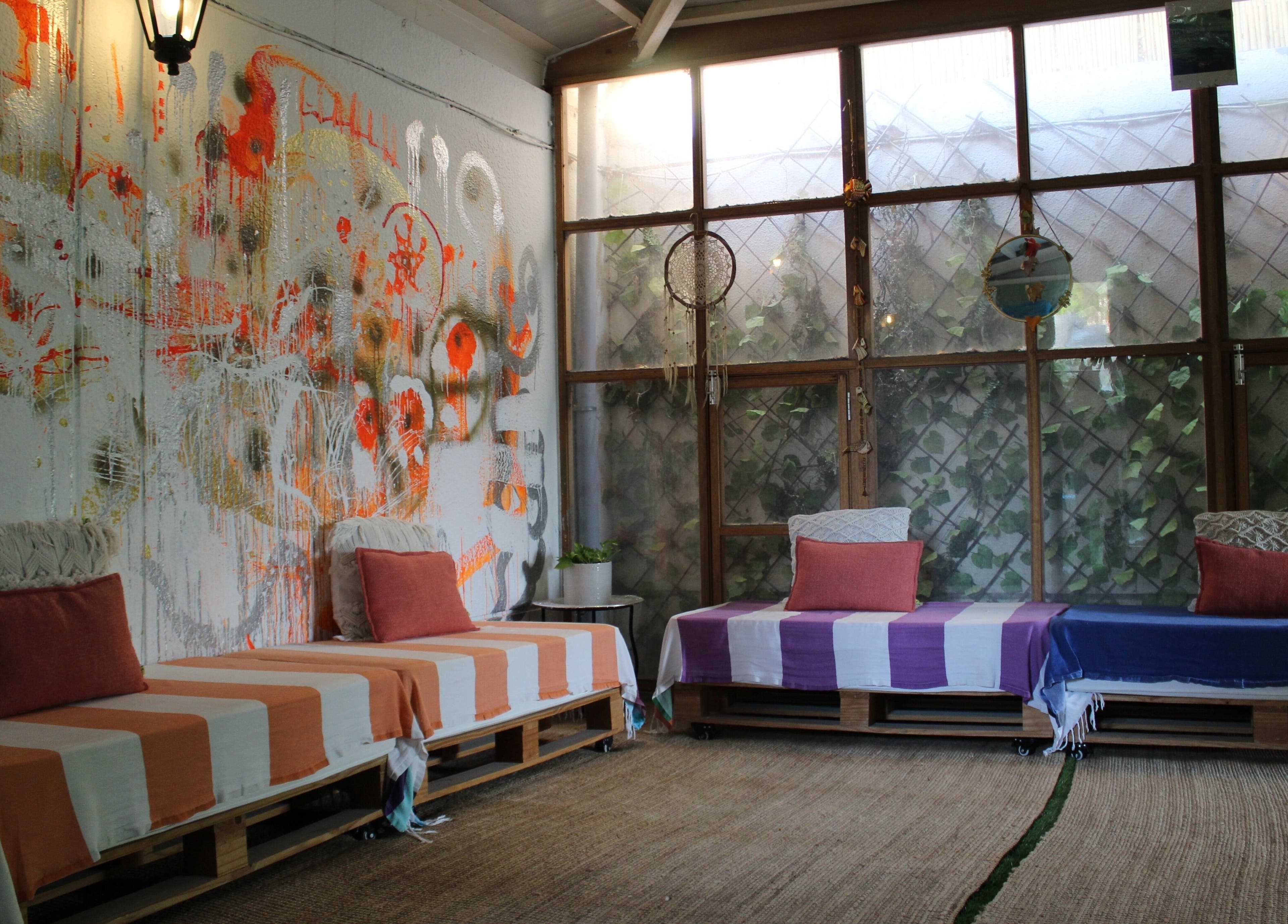 Relaxing lounge area with artistic wall at I Am More, Dubai, Dubai, AE enhancing wellness and comfort.