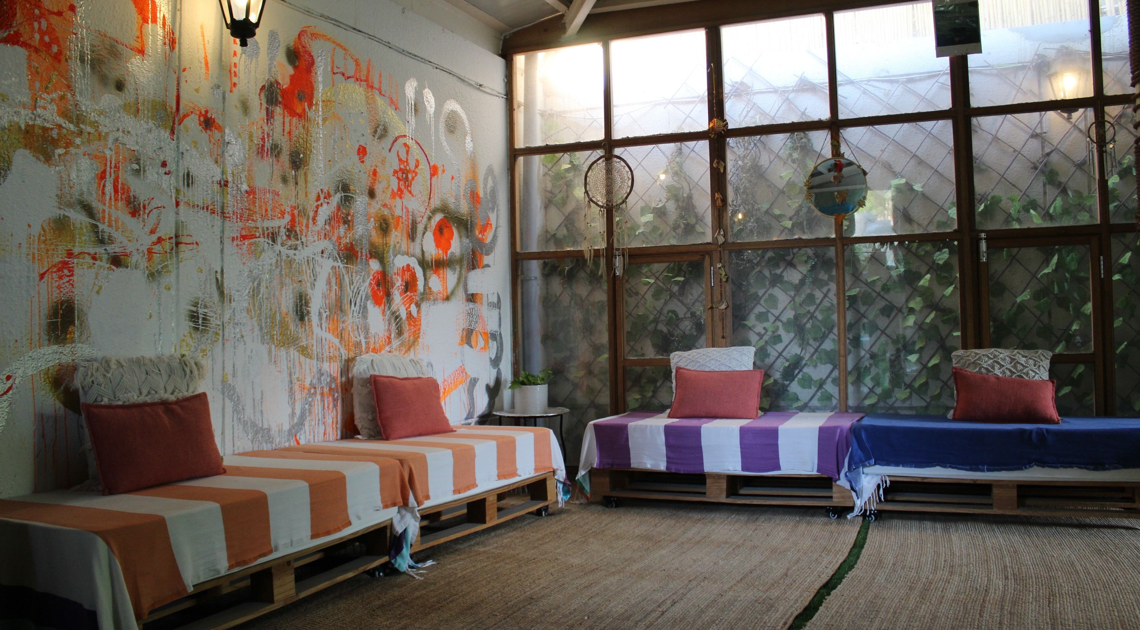 Relaxing lounge area with artistic wall at I Am More, Dubai, Dubai, AE enhancing wellness and comfort.