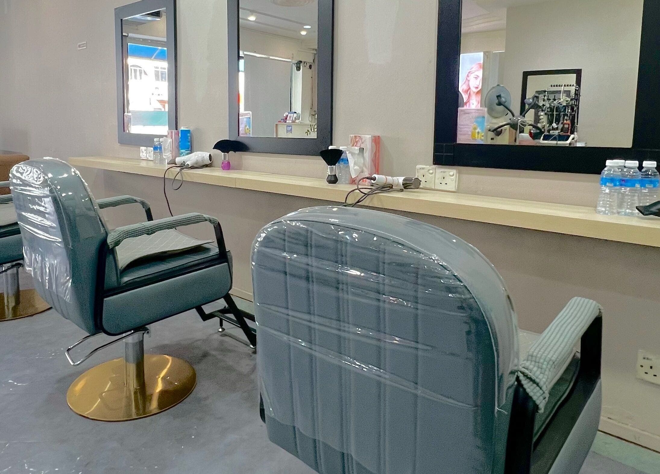 Modern salon chairs at Hair Moment Salon in Subang Jaya, Selangor, MY, ready for the next client.