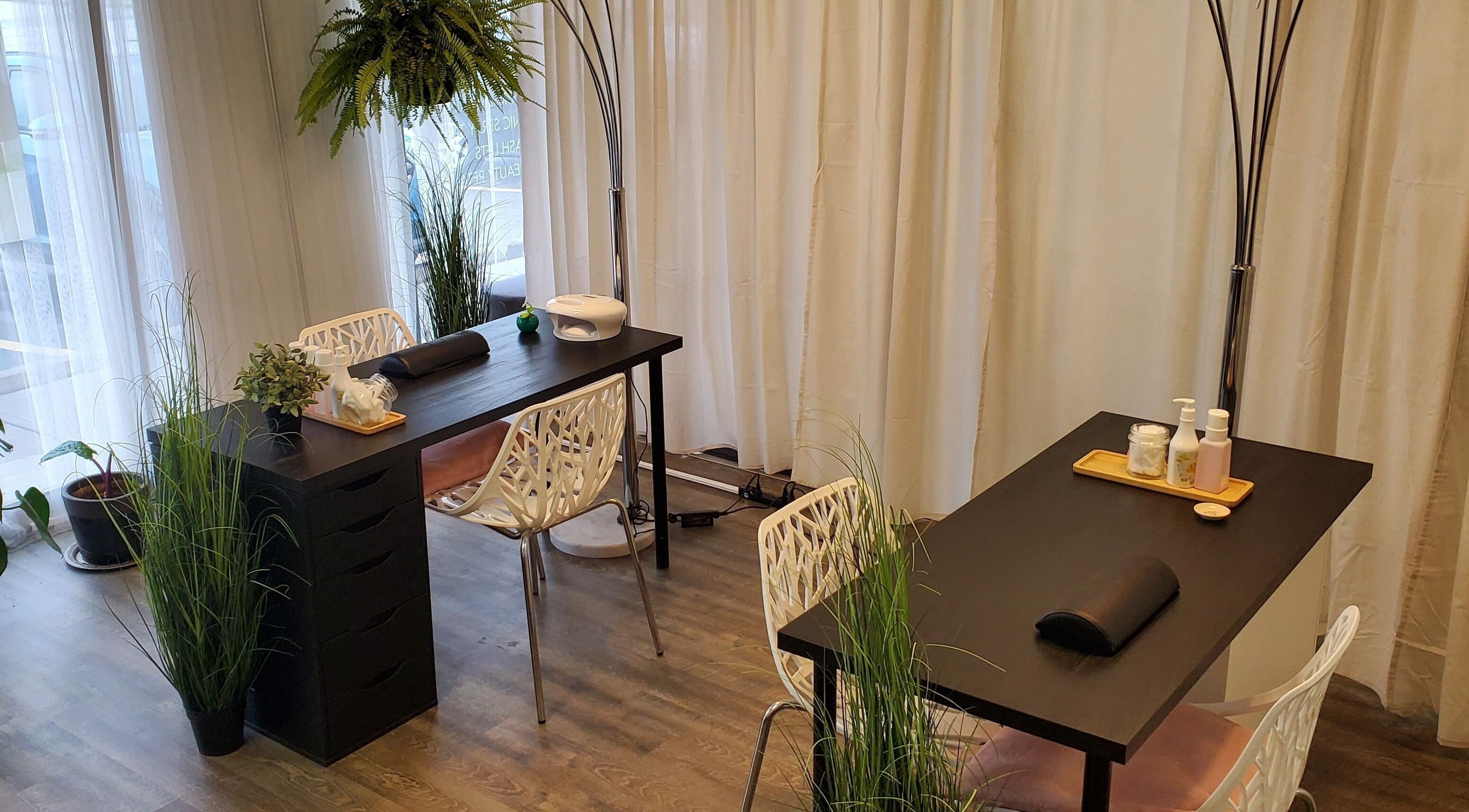 Chic, serene setup at Flourish Skin Studio, Hamilton, Ontario, CA, with elegant decor and tranquil vibes.