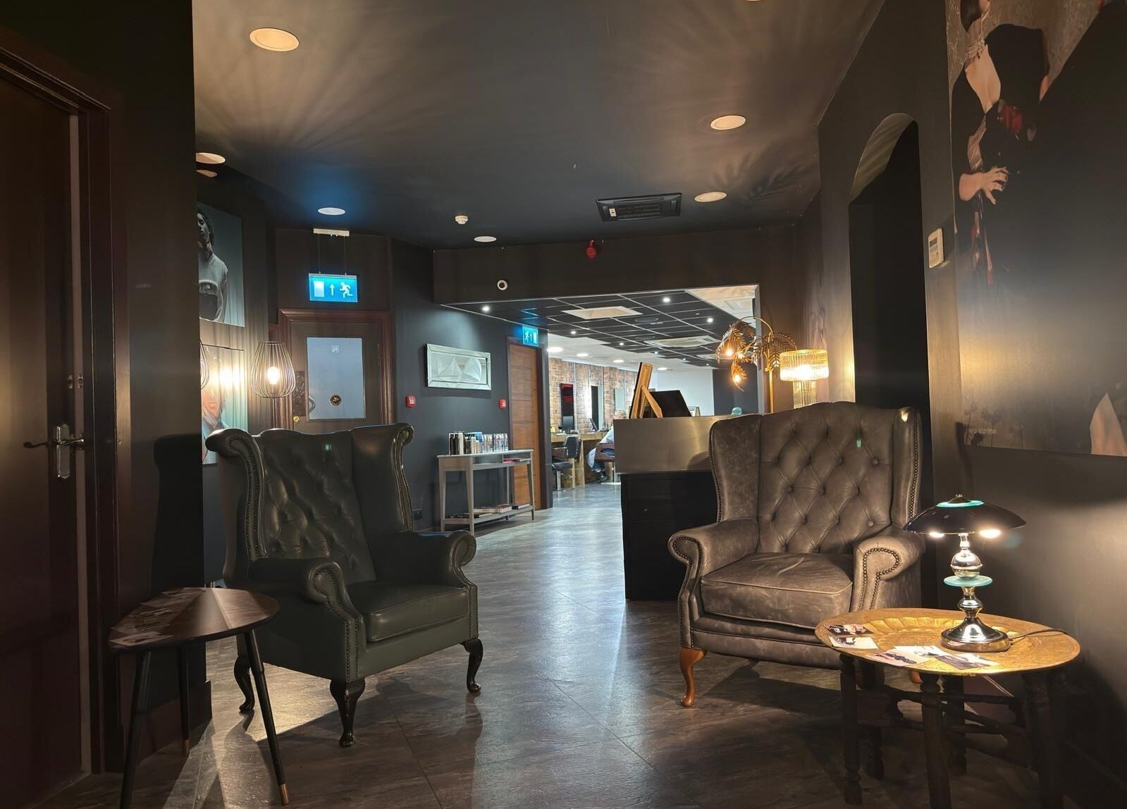 Cozy seating area in Nelson Brown, Dumfries, Scotland, GB showcasing luxurious decor and ambient lighting.