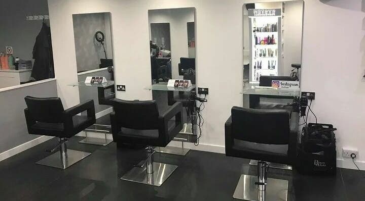 Modern salon chairs at Bella Me Hair and Beauty, Clarkston, Scotland, GB, ready for stylish transformations.