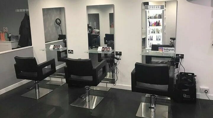Modern salon chairs at Bella Me Hair and Beauty, Clarkston, Scotland, GB, ready for stylish transformations.