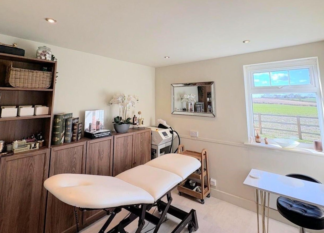 Cozy treatment room at Proper Beauty Chicheley, Newport Pagnell, England, ideal for relaxation and rejuvenation.