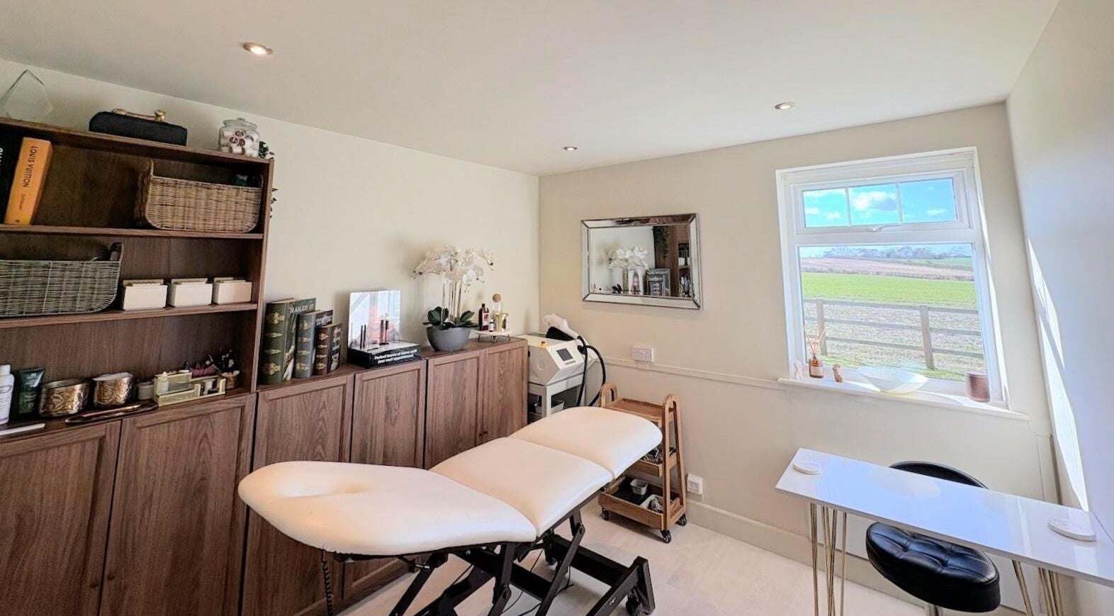 Cozy treatment room at Proper Beauty Chicheley, Newport Pagnell, England, ideal for relaxation and rejuvenation.