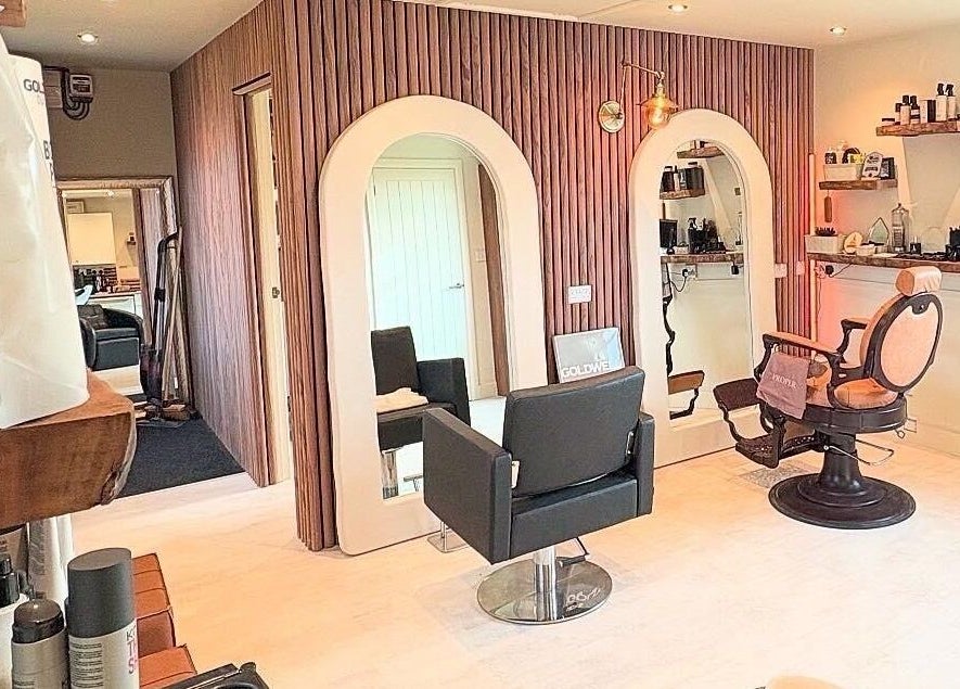 Modern salon chair at Proper Beauty Chicheley, Newport Pagnell, England, GB. Stylish and inviting interior.