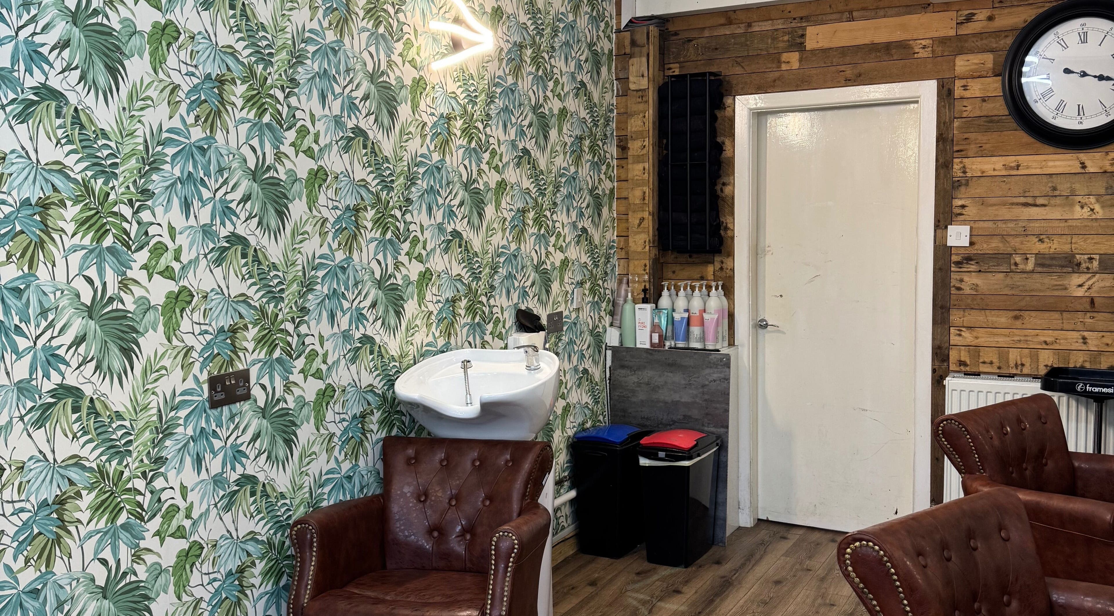 Elegant tropical-themed interior at Christopher at BLUNT FRINGE Salon, Rowley Regis, England, GB.