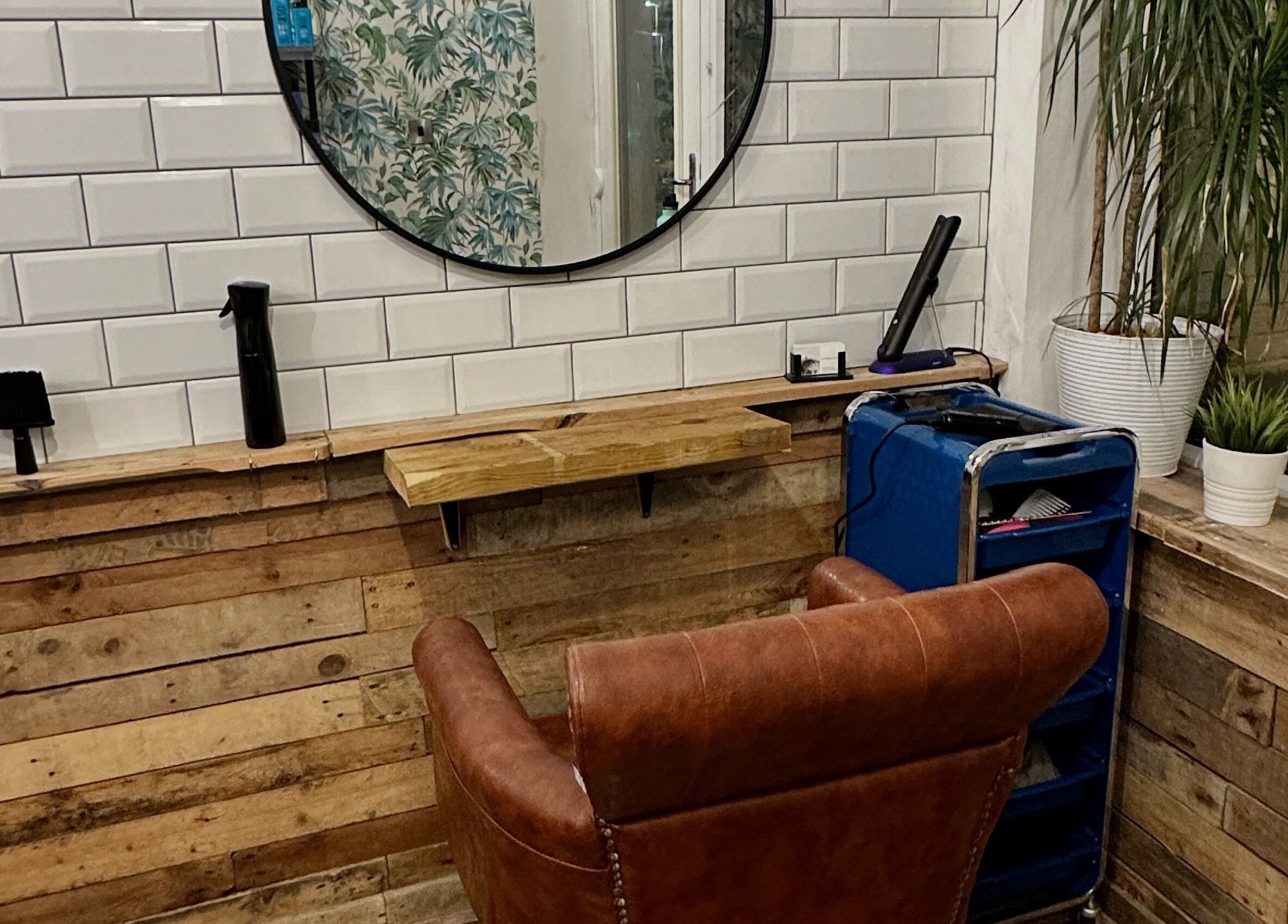 Cozy salon chair and station at Christopher at BLUNT FRINGE Salon, Rowley Regis, England, GB.